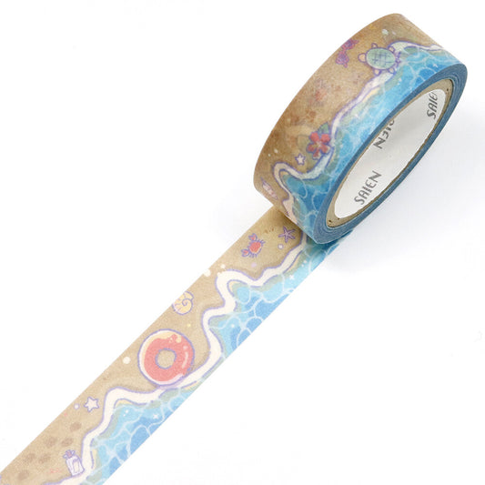 Beach-themed masking tape showing a wave washing up on a sandy beach. The image has a white background.