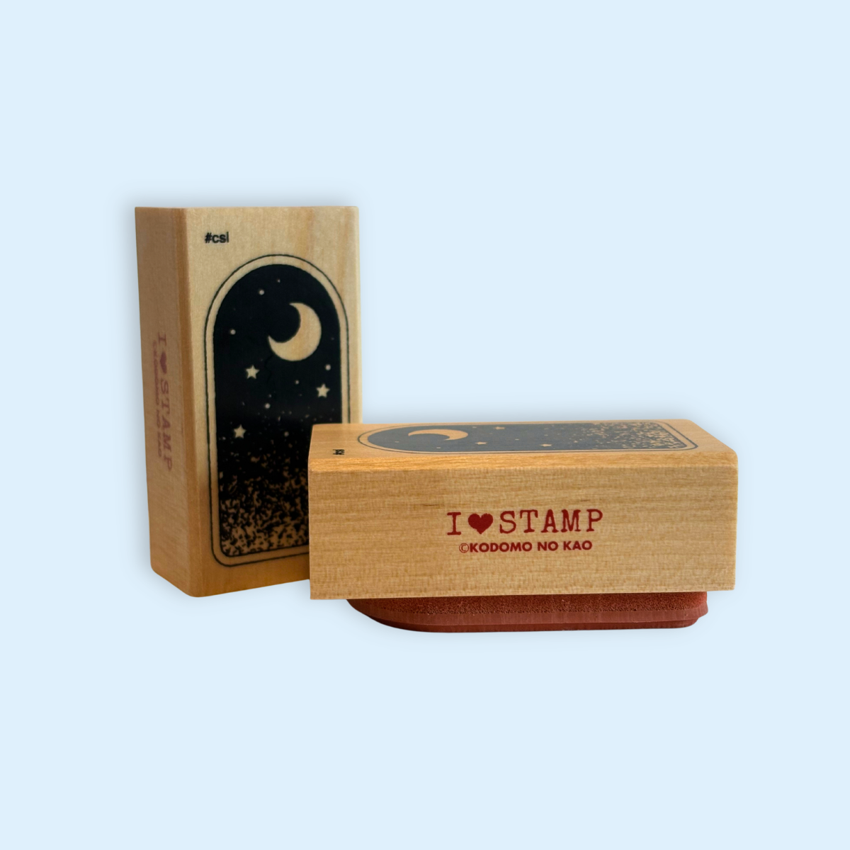Midnight Sky Window Rubber Stamp with moon and stars design. Image shows the wooden stamp block from the front and the side. 