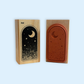 Midnight Sky Window Rubber Stamp showing a crescent moon and stars on a wooden block with rubber stamp side visible