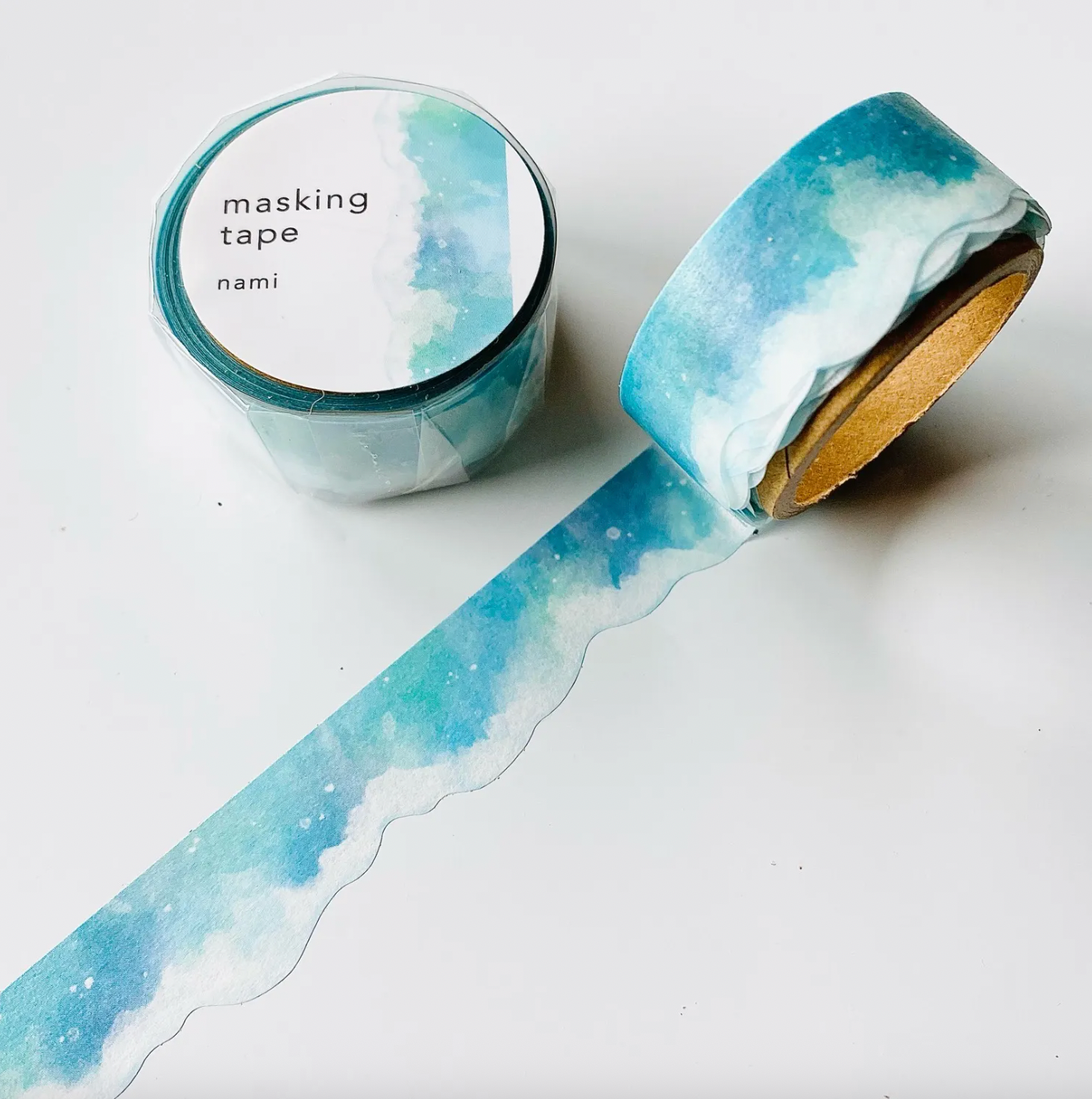 Masking tape with ocean wave design on a white background