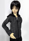 A doll with short black hair wearing a dark gray and black textured zip-up jacket with a black hood, posed against a plain light background.