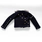 A black long-sleeve cropped jacket with silver pyramid studs, spiked shoulder details, and distressed ripped sections on the sleeves, displayed against a light gray background.