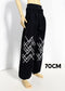 Black wide-leg pants with white geometric line patterns on the lower legs, shown on a ball-jointed doll with a '70CM' size label overlay.