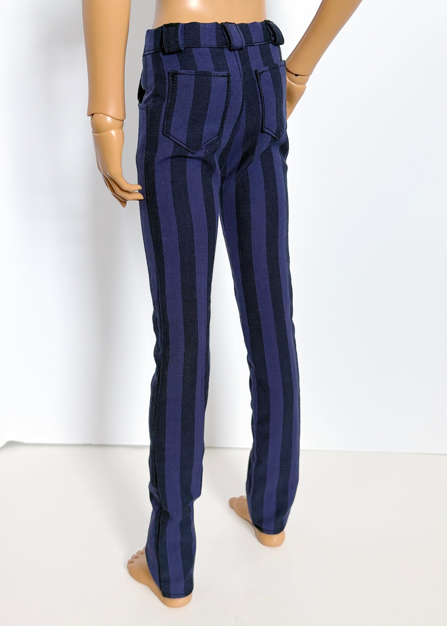Navy striped pants on a mannequin against a white background