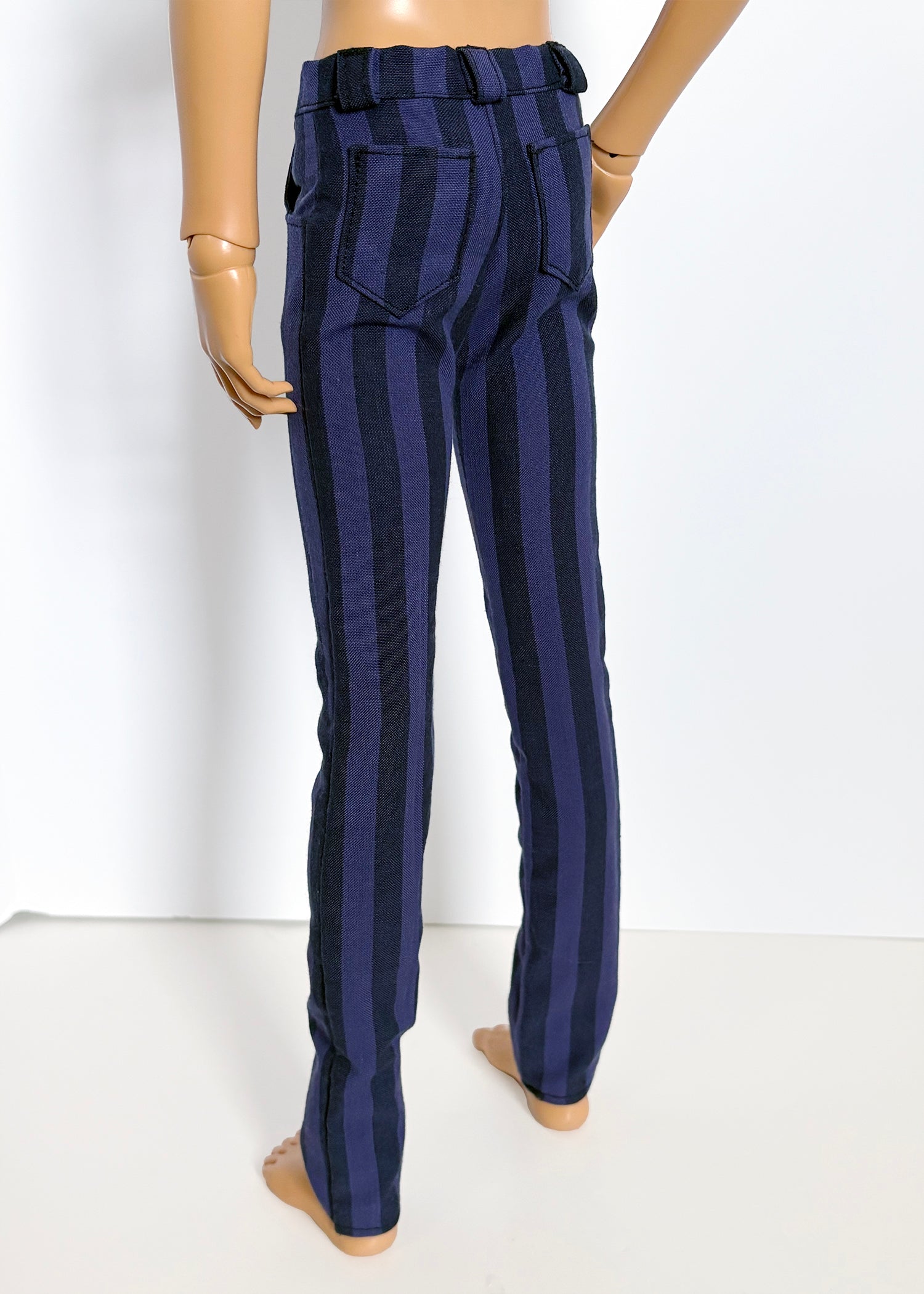 Navy striped pants on a mannequin against a white background