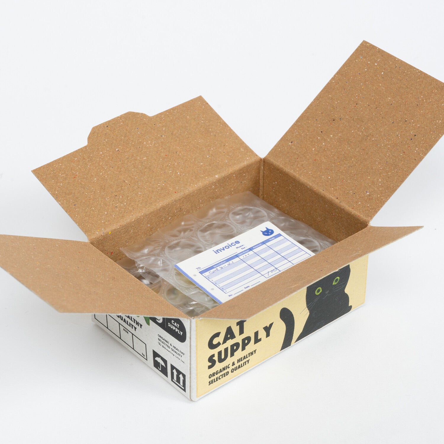 Open cardboard box labeled 'Cat Supply' with bubble wrap inside on a white background