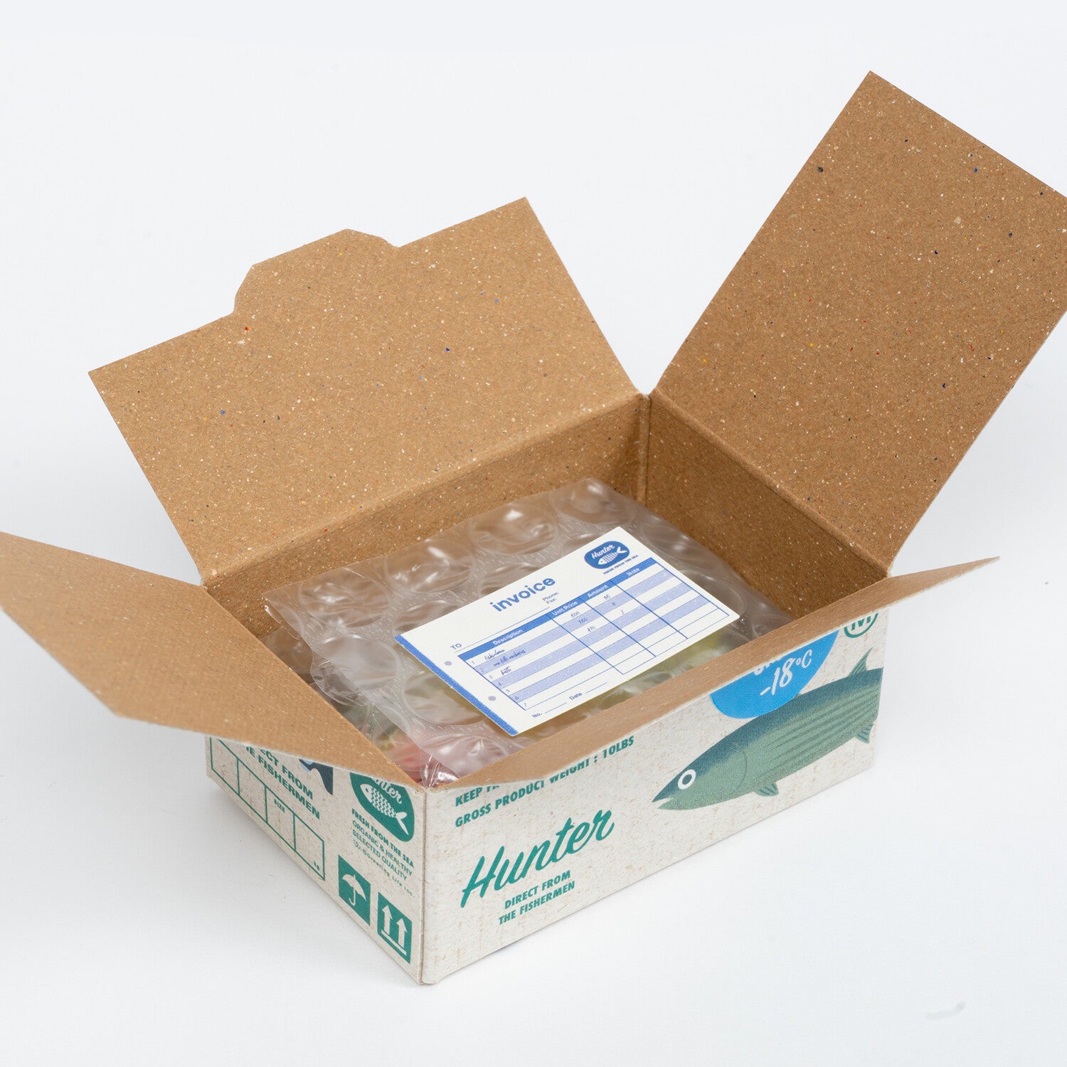 Open cardboard box with a printed invoice inside on a white background
