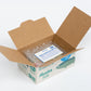 Open cardboard box with a printed invoice inside on a white background